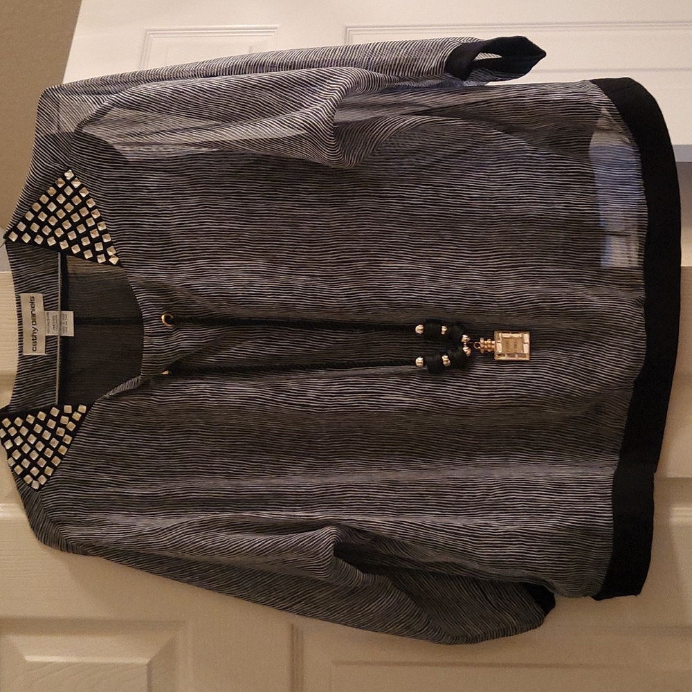 Womens gray white and black shirt.